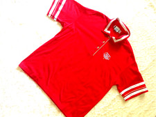 FILA SIZE M/L 100 COTTON RET 78.00 RED TENNIS POLO W/WHT GOLD TRIM