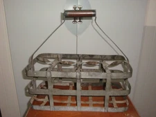 Ancien porte bouteilles en zing a 6 casiers