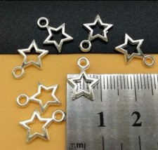 10 pieces New HOLLOW SILVER STAR Charm Silver Metal Alloy 10x12 mm FREE SHIPPING