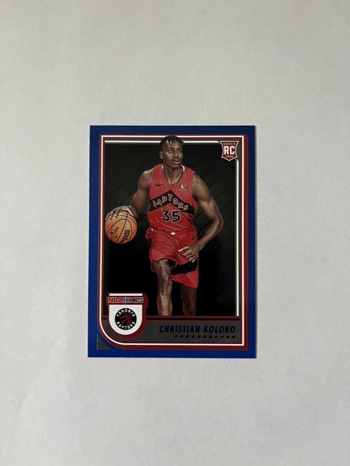 2022-23 NBA Hoops Christian Koloko Rookie RC Base Blue #261 Raptors
