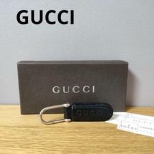 GUCCI Logo Keychain Black Leather Logo Embossed