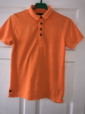 bright orange polo