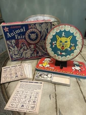 RARE! VINTAGE TIN TOY THE RANGER ANIMAL FAIR, BINGO PINWHEEL GAME. RANGER STEEL
