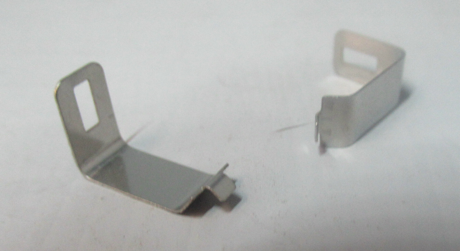 A "NEW" OS PAIR OF LIFELIKE PICK UP SHOES FOR T CHASSIS HO SLOT CARS