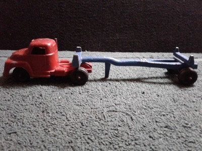 SLIK Toys Logging Tractor No. 9610C & Trailer Not Marked, Lansing Iowa, USA