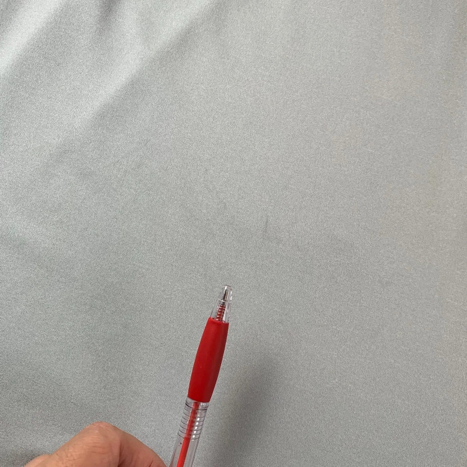 Camisa polo de golf Nike Dri-Fit para hombre talla grande plateada con detalles azules elástica Foto 3 de 4