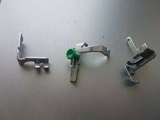 3 x Nähfüße / 1 x Säumer / 1 x für Reißverschluß / 1 x für Knopfloch