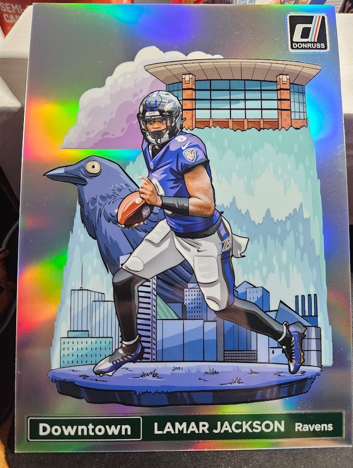 2024 Panini Donruss #1 Lamar Jackson Jumbo Downtown Baltimore Ravens