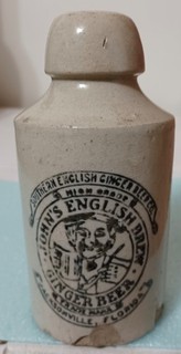 5 5/8" JOHN'S ENGLISH BREW JACKSONVILLE FLORIDA STONEWARE GINGER BEER BOTTLE