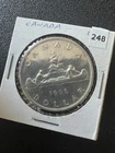 1956 Canada Silver One Dollar Coin. SEMI KEY  NICE GRADE