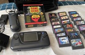 Sega Game Gear System- Console + 21 Games + Genie + Case and Accessories Works