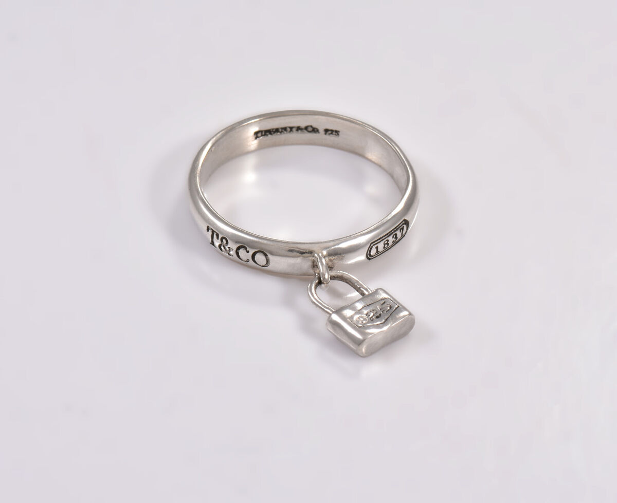 Size 8.5 Tiffany & Co 1837 Silver Dangling Lock Band Ring in Size 8.5 Tiffany & Co 1837 Silver Dangling Lock Band Ring in