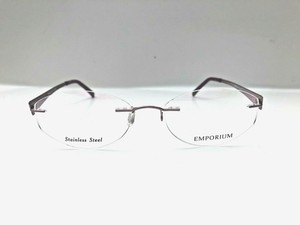 purple rimless eyeglasses