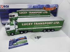 Auctions | Lion Toys (1/50th) A pair Of Truck and Trailers - (1) Scania 'Nooteboom' - Red and (2) DAF 'Cadzow' - Green, red and white