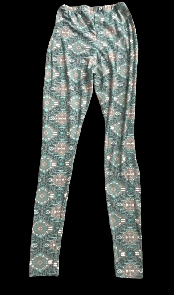 Pantalones ajustados RUE 21 para mujer talla pequeña estampado tribal 27,5" entrepierna Foto 2 de 4