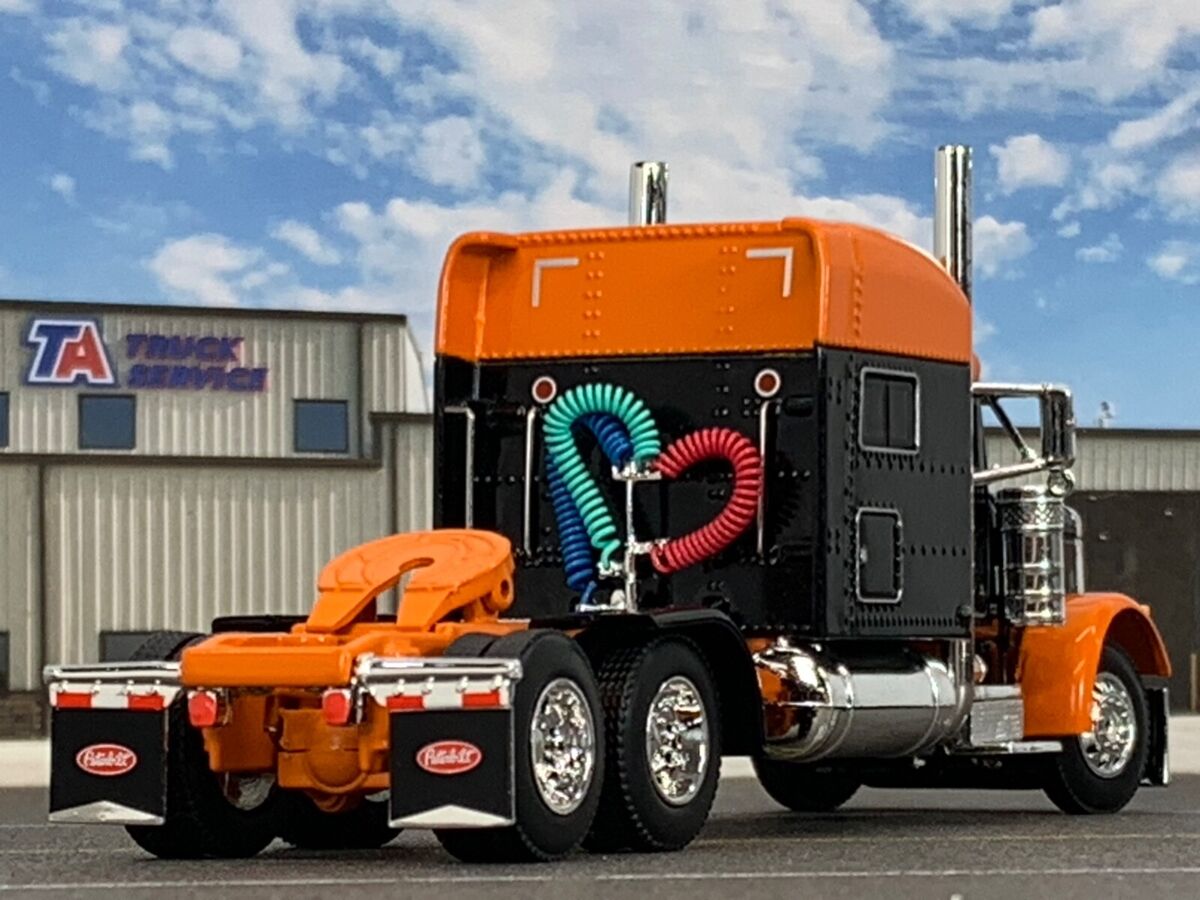 1/64 DCP BLACK/ORANGE PETERBILT 379 W/ 70 1/64 DCP BLACK/ORANGE PETERBILT 379 W/ 70