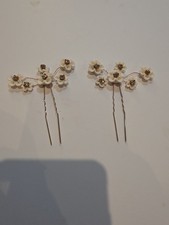 elegant ivory flower and rhinestone hair pins on delicate wire stems