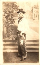 Real Photo Postcard Cowboy Studio Portrait Man Chaps Hat Gun Western Americana