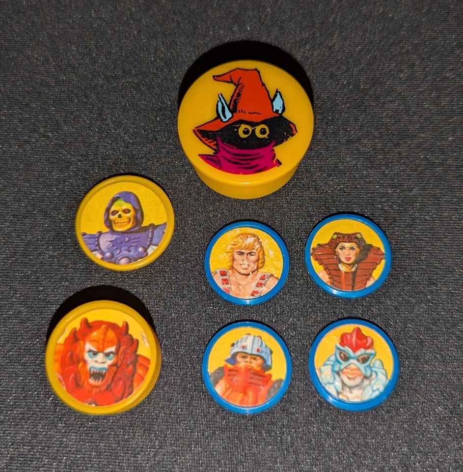 A complete 1983 Orko Magic Trick 7-disk set — an obscure, complete MOTU tie-in that most 80s kids never even knew existed.