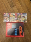 Nintendo Switch console with 4 Games Brand New Boxed Never Used