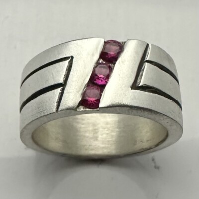 MJG STERLING SILVER WEDDING BAND. 3  LAB RUBIES.  16 G. SZ 10 1/4
