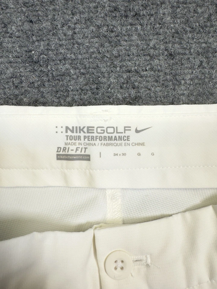 Pantalones Dri-Fit Nike Golf Tour Performance para hombre 34x30 beige crema frente plano Foto 2 de 4