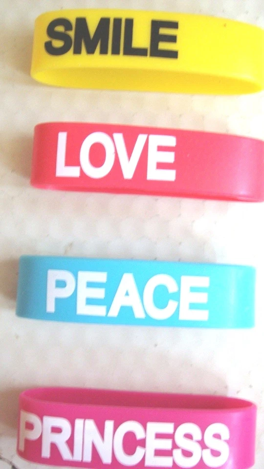 PULSERAS JUMBO BANDA SILICONA 1" - TÚ ELIGES -- SONRISA, PRINCESA, AMOR, PAZ Foto 2 de 4