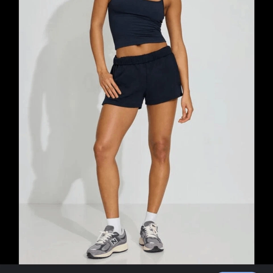 Pantalones Cortos Garage Mujer Azul Marino Suave Terry Alto Años 80’s con Bolsillos Foto 2 de 4