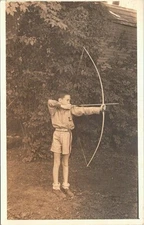 RPPC Young Boy in Uniform Shooting Large Bow & Arrow 1937