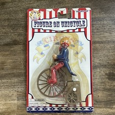 Circus clown Figure on Unicycle wind up toy vintage