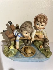 Artmark Porcelain Figurine of Boy & Girl on Bridge Retrieving Hat From Stream