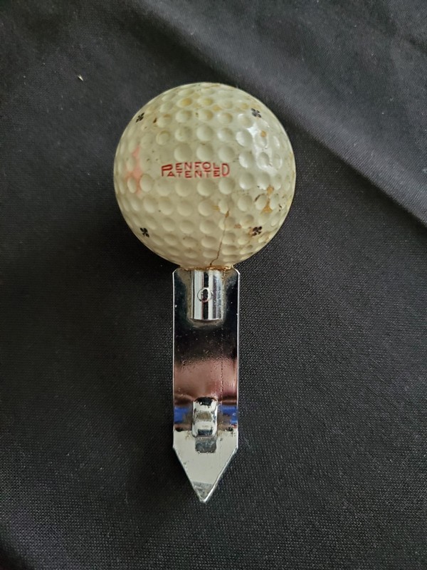 Vintage Penfold golf ball can opener