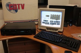 CCOMMODORE CDTV BOXED + CD-1221 KEYBOARD + CD-1253 MOUSE + GENLOCK 1301 LV4 91184