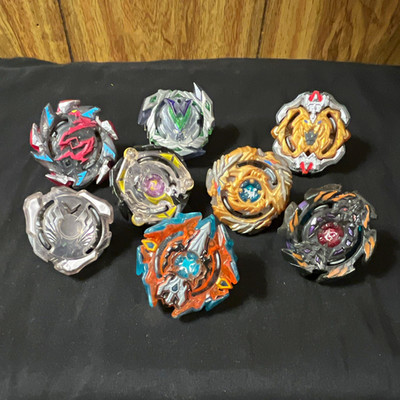 Beyblade Lot of 8 Spinning Battle Tops, Beyblade Character Family, Ages 8-11