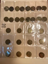 27 Year Collection of Chuck e Cheese Tokens 1990 to 2016 both styles of 1990 tok
