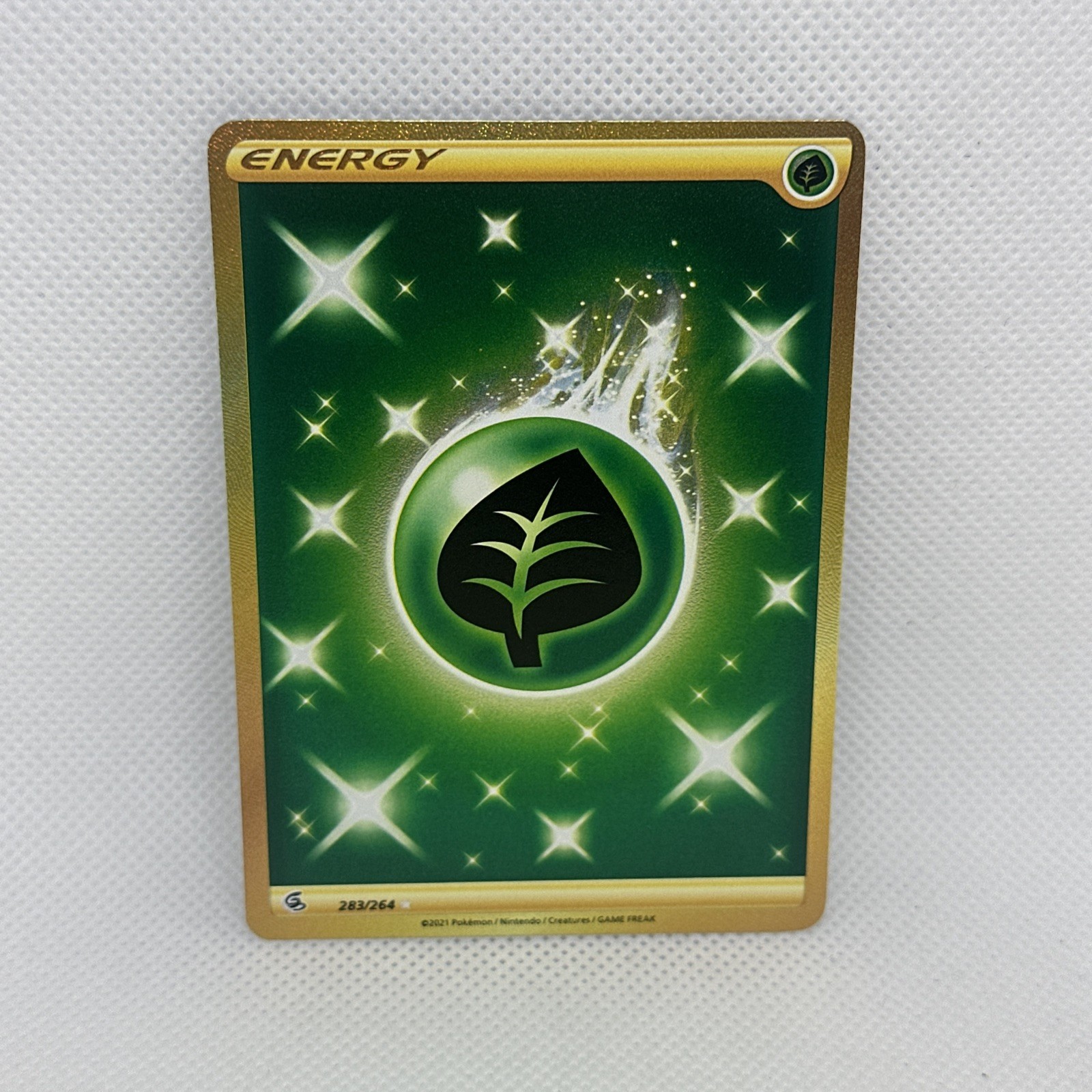 Grass Energy (Secret) 283/264 Swsh08: Fusion Strike Holo