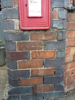Photo 6x4 OS benchmark - Balsall Street, letterbox An OS cutmark on a bri c2017