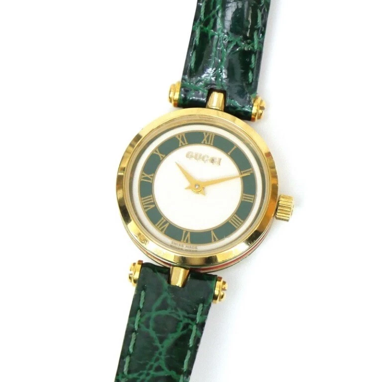 Montre femme GUCCI Sherry quartz ceinture cuir vert plaque blanche occasion