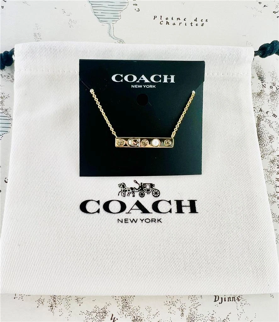 Collana oro cristallo pietra e firma Coach nuova