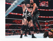 WWE BRONSON REED SIGNED KICKING BUTT 8X10