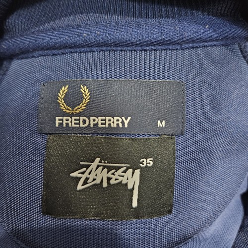 Chaqueta deportiva Fred Perry X Stussy azul marino para hombre talla mediana cinta lateral logotipo RARA - Imagen 13 de 16