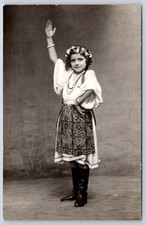 Antique Romania PC young girl in traditional folk dress RPPC
