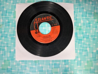 Laura Branigan, five Atlantic 45s, Solitaire, Lucky One, Ti Amo, Shattered Glass