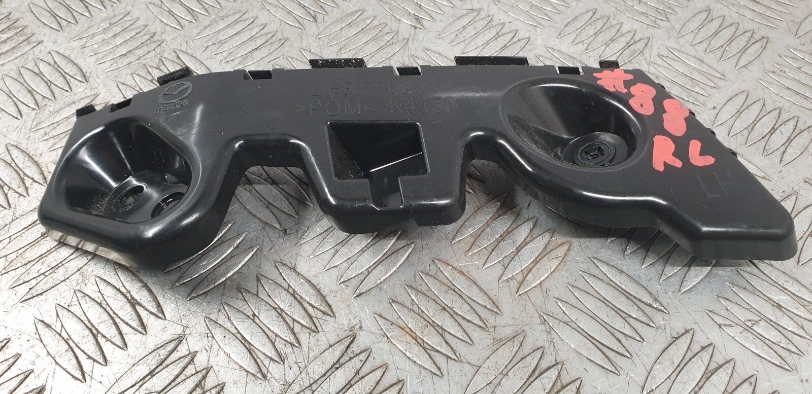 #88 GENUINE MAZDA CX-30 20-23 REAR BUMPER LEFT SIDE MOUNT BRACKET DFR5-50-2J1