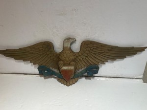 Vintage painted base metal American Bald Eagle shield & ribbon wall plaque 27”