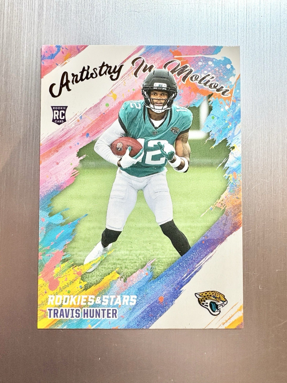 2025 Panini Rookies & Stars Travis Hunter Artistry In Motion #8 Jaguars Rc