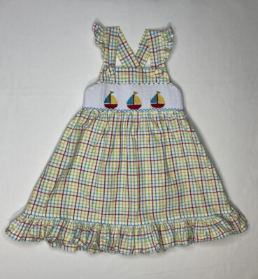 white christmas dresses Shine Like A Pearl Yellow Smocked Dress by Classic Whimsy - Girls Dresses