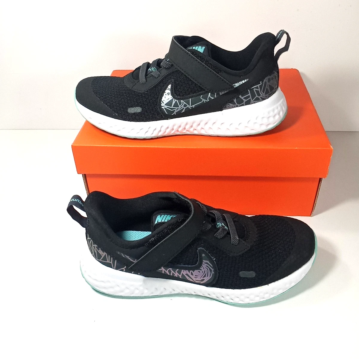 Scarpe da corsa Nike unisex bambini nere Teal Revolution 5 atletiche taglia US 12 5 C