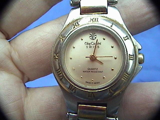 oleg cassini watch value