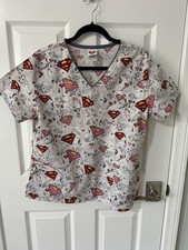 DC Comics Super Girl Scrub Top. Women s Size M. 3 Pockets.
